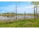 Scenic view of the pond, showcasing the backyard's serene waterfront location at 2916 Maldive Ct, Deltona, FL 32738
