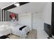 Fun, themed bedroom with two twin beds, cartoon décor, and plenty of storage at 2923 Banana Palm Dr, Kissimmee, FL 34747