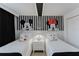 Fun, themed bedroom with two twin beds and cartoon décor at 2923 Banana Palm Dr, Kissimmee, FL 34747
