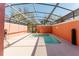 Screened-in pool and lanai with outdoor seating and landscaping offer a private backyard oasis at 2923 Banana Palm Dr, Kissimmee, FL 34747