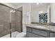 Bathroom featuring a glass-enclosed shower, granite countertops, and a view to a themed bedroom at 3082 Mahalo Dr, Davenport, FL 33897