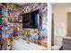 Themed bedroom with comic book wallpaper and adjacent bathroom at 3082 Mahalo Dr, Davenport, FL 33897