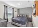 Nicely decorated bedroom with themed decor and comfortable furnishings at 3082 Mahalo Dr, Davenport, FL 33897