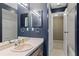 This bathroom features a vanity and mirror at 3150 Rider Pl, Orlando, FL 32817