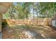 Fenced backyard offering privacy and space for outdoor activities at 3304 Vancouver Ave, Deltona, FL 32738