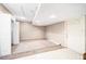 A spacious finished basement with new carpet sits ready to be transformed into a rec room or home office at 3304 Vancouver Ave, Deltona, FL 32738