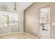 Dining room with tile flooring, a chandelier, and a large window for ample natural light at 3304 Vancouver Ave, Deltona, FL 32738