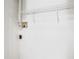 White laundry room with shelving and a duct for the clothes dryer at 3304 Vancouver Ave, Deltona, FL 32738