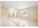 Bright room with front door, double door closet, and tile floor at 3304 Vancouver Ave, Deltona, FL 32738