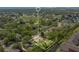 Aerial view of the property, highlighting its location near the canal and lush surroundings at 3431 Hunt Ln, Oviedo, FL 32765