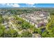 A vibrant neighborhood with colorful homes, lush greenery, and convenient parking create a picturesque living experience at 3431 Hunt Ln, Oviedo, FL 32765