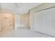 Spacious bonus room with tile floors, closet, storage and access to other rooms of the home at 3431 Hunt Ln, Oviedo, FL 32765