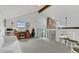 Bonus room featuring a vaulted ceiling, a staircase, and plenty of natural light at 3501 Danby Ct, Orlando, FL 32812