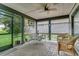 Relaxing screened patio with brick floor and a dining set overlooking the green yard at 3501 Danby Ct, Orlando, FL 32812