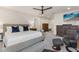 This bedroom features a luxury bed, soft carpeting, and stylish wooden furniture at 3804 Corona Ct, Sanford, FL 32773