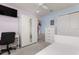 This bedroom features a modern wardrobe, pastel walls, and a ceiling fan for added comfort at 3804 Corona Ct, Sanford, FL 32773