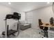 The office includes a treadmill, comfortable seating, and a functional workspace at 3804 Corona Ct, Sanford, FL 32773