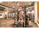 A spacious gym with modern weightlifting and exercise equipment for a complete workout at 3963 Turow Ln, Orlando, FL 32828