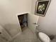 Under stair storage located in the powder room at 3963 Turow Ln, Orlando, FL 32828