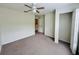 Bright bedroom with neutral carpet, and closet at 4010 Santa Maria Dr # 106, Kissimmee, FL 34741