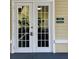 Fitness center entrance with glass doors and visible workout equipment at 4010 Santa Maria Dr # 106, Kissimmee, FL 34741