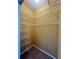 Well-organized walk-in closet with shelving for ample storage at 4010 Santa Maria Dr # 106, Kissimmee, FL 34741
