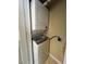 Inside utility closet is a stacked washer dryer unit at 4010 Santa Maria Dr # 106, Kissimmee, FL 34741