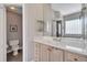 Bathroom featuring a vanity, soaking tub, and separate toilet room at 424 Curry Ct, Altamonte Springs, FL 32714