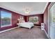 This bedroom features an abundance of natural light and neutral carpet for a warm and inviting space at 424 Curry Ct, Altamonte Springs, FL 32714