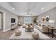 A bright living room with plush seating, contemporary decor, and access to an outdoor balcony at 424 Curry Ct, Altamonte Springs, FL 32714