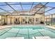 Enjoy a private pool with a screened lanai and outdoor seating, perfect for relaxation and entertaining at 424 Curry Ct, Altamonte Springs, FL 32714