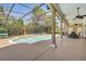 Relax by the refreshing pool and expansive lanai with covered seating, offering a serene outdoor oasis at 424 Curry Ct, Altamonte Springs, FL 32714