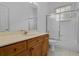Well-lit bathroom features a vanity with ample storage and a shower-tub combination at 432 Valley View Dr, Winter Garden, FL 34787
