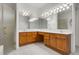 Bathroom featuring double vanity and glass enclosed shower at 432 Valley View Dr, Winter Garden, FL 34787