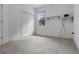 Cozy bedroom featuring plush carpeting, ample natural light, and a spacious closet at 432 Valley View Dr, Winter Garden, FL 34787