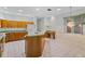 Spacious eat-in kitchen with center island and oak cabinets at 432 Valley View Dr, Winter Garden, FL 34787
