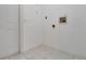 Bright laundry area with white walls and tile flooring, ready for appliances at 432 Valley View Dr, Winter Garden, FL 34787