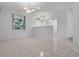 Spacious living area with tile flooring, abundant natural light, and an open layout for comfortable living at 432 Valley View Dr, Winter Garden, FL 34787
