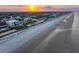 Panoramic aerial view showcasing a beachfront home on the coast at 4647 Van Kleeck Dr, New Smyrna Beach, FL 32169