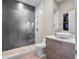 Sleek bathroom featuring a glass shower, modern vanity, and minimalist design at 4647 Van Kleeck Dr, New Smyrna Beach, FL 32169