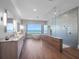 Modern bathroom with ocean views, a soaking tub, a large shower, and dual vanities for a spa-like experience at 4647 Van Kleeck Dr, New Smyrna Beach, FL 32169