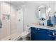 Beautiful bathroom featuring a modern vanity, walk-in shower, and stylish fixtures at 4647 Van Kleeck Dr, New Smyrna Beach, FL 32169