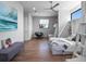 Bright and airy bedroom with built-in bunk beds, wood floors, and stylish decor at 4647 Van Kleeck Dr, New Smyrna Beach, FL 32169