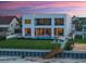 Beautifully landscaped beachfront home with a pool, expansive lawn, and private beach access at 4647 Van Kleeck Dr, New Smyrna Beach, FL 32169