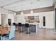 Contemporary kitchen with an island, white cabinetry, and stainless steel appliances, perfect for Gathering gatherings at 4647 Van Kleeck Dr, New Smyrna Beach, FL 32169