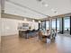 Modern kitchen with a dining area, white cabinetry, and ocean views at 4647 Van Kleeck Dr, New Smyrna Beach, FL 32169