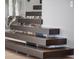 Close up of the modern staircase, showing the detail of its design at 4647 Van Kleeck Dr, New Smyrna Beach, FL 32169