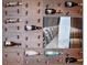 Unique custom wine rack features wooden pegs to display your curated collection of vintages at 4647 Van Kleeck Dr, New Smyrna Beach, FL 32169