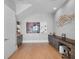 Custom wine room with display, beverage center, hardwood floors, and accent lighting at 4647 Van Kleeck Dr, New Smyrna Beach, FL 32169