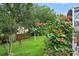 Enjoy the gorgeous lawn, garden, and the enclosed back patio, perfect for relaxation and outdoor activities at 468 Alinole Loop, Lake Mary, FL 32746